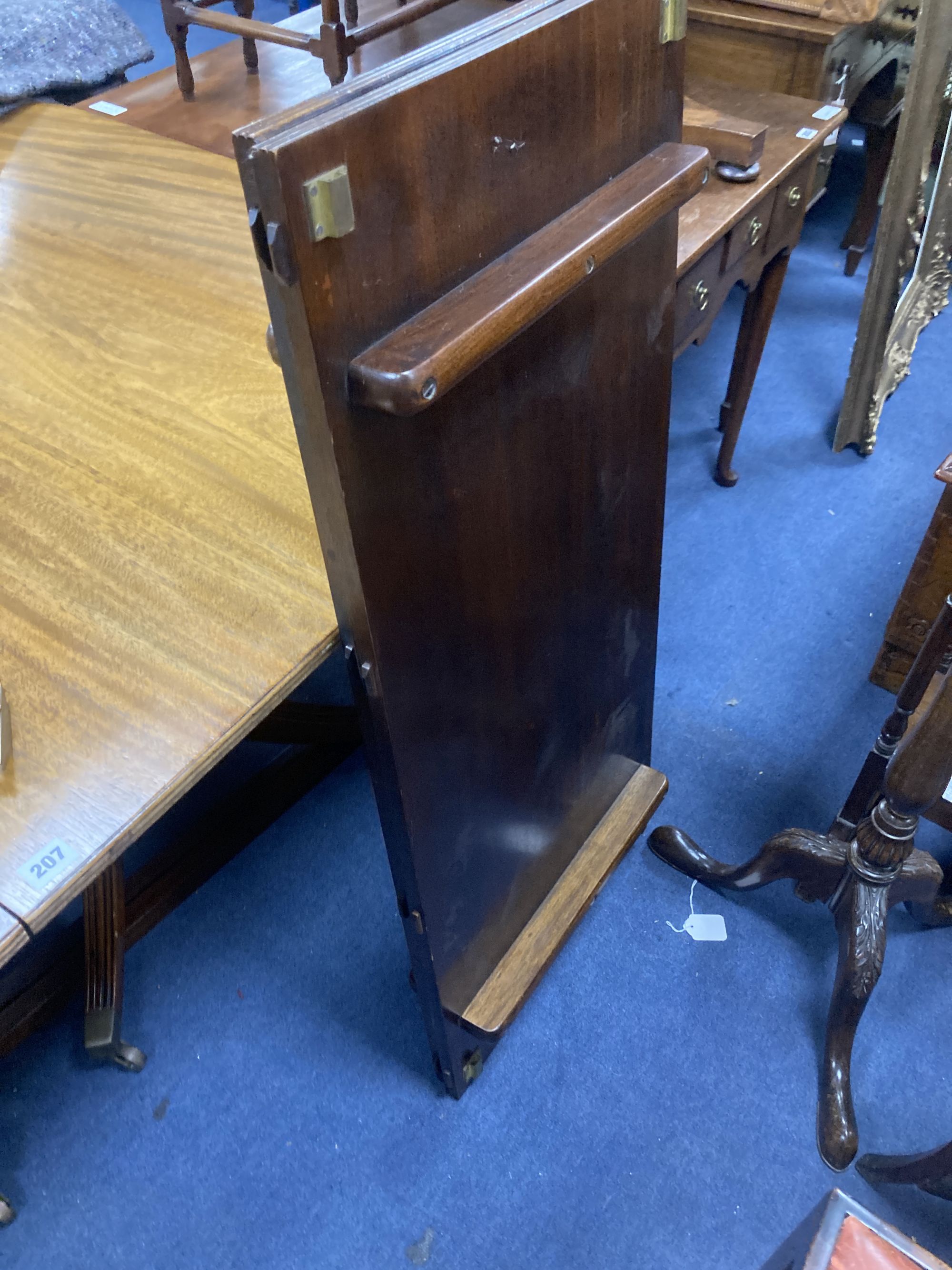 A George III style mahogany twin pedestal dining table, with two spare leaves, length 175cm, depth 106cm, height 71cm